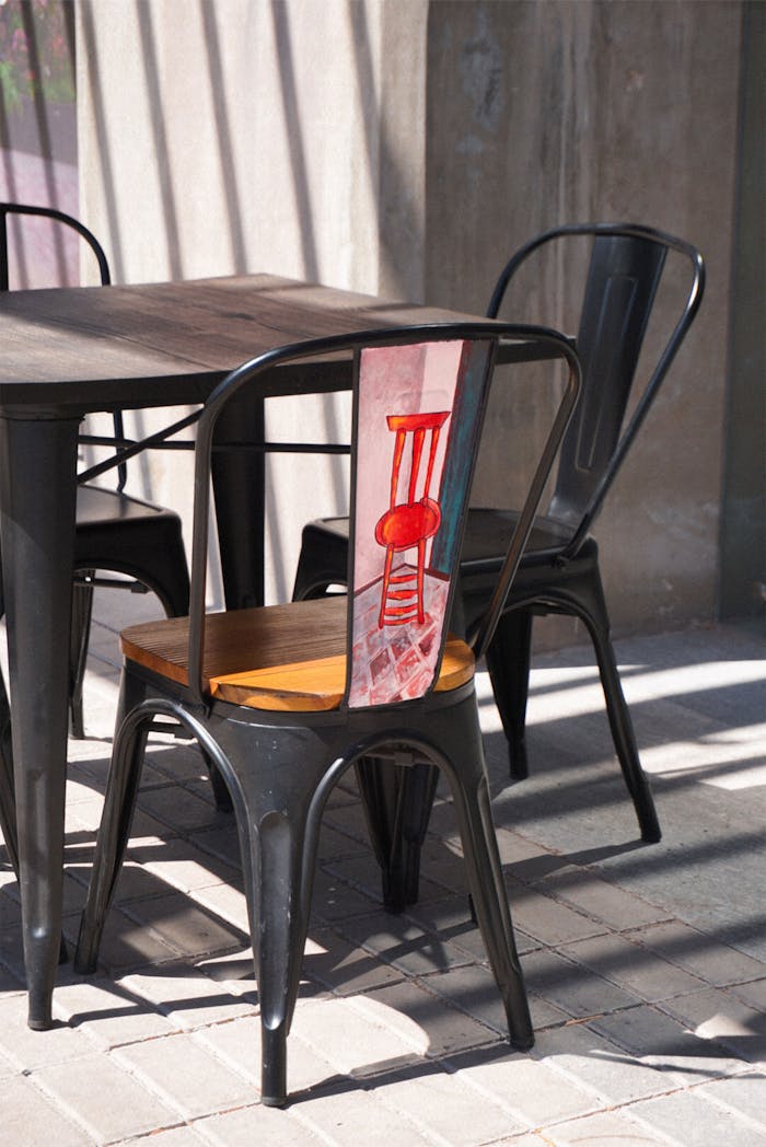 Outdoor seating arrangement with industrial chairs and table in Chihuahua, Mexico.